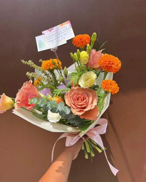 Seasonal and local flower bouquet from a florist and flower shop in downtown Raleigh, North Carolina. An assorted flower bouquet or arrangement available for delivery near Raleigh, Durham, Cary, and Garner, NC